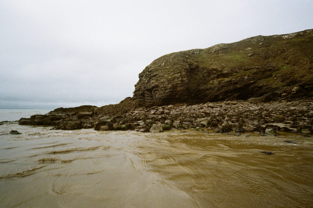 wet sand rocky coast