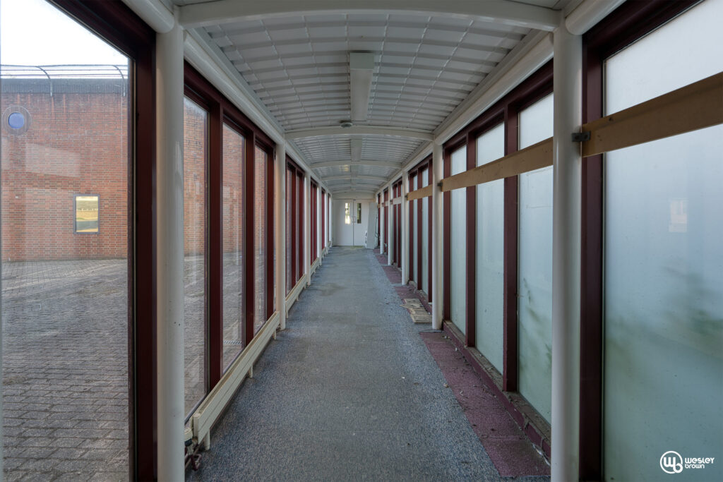 Broadmoore Hospital_2 copy Long glass corridor at Broadmoor Hospital