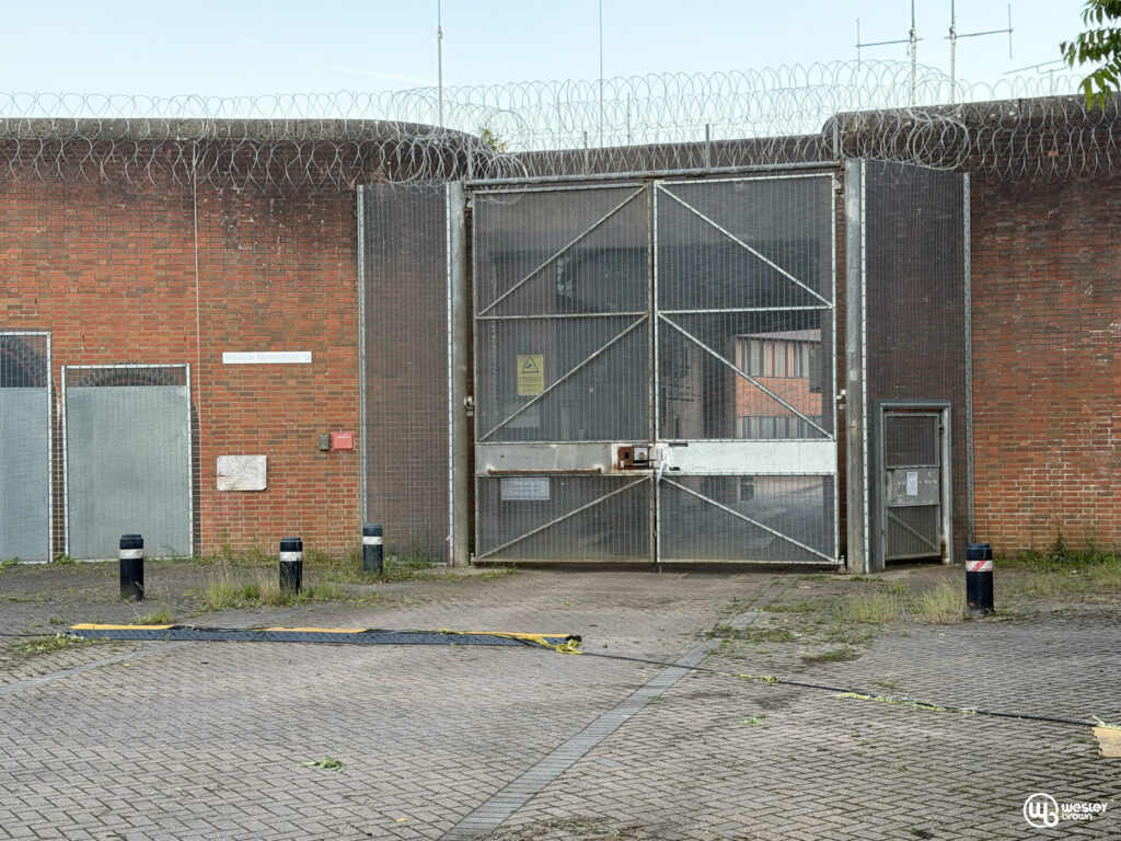 Broadmoore Hospital_51 Entrance gate of Broadmoor Hospital surrounded by barbed wire